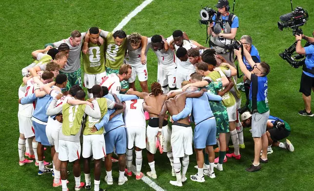 England players huddles after the World Cup round of 32 soccer match between England and Congo in Atlanta, Wednesday, July 1, 2026. (AP Photo/Colin Hubbard)