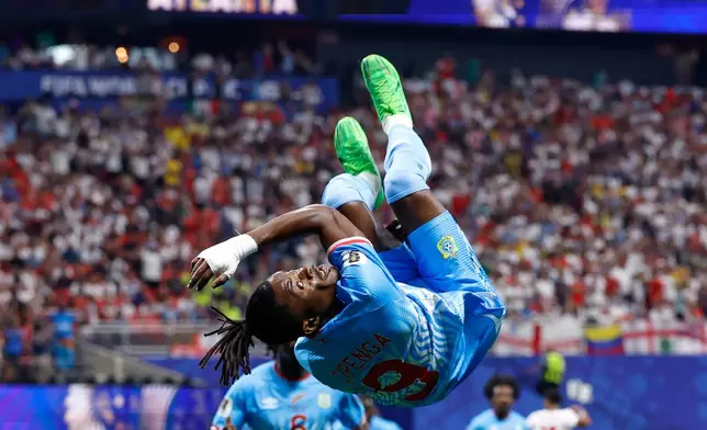 Congo's Brian Cipenga (9) celebrates after scoring their first goal during the World Cup round of 32 soccer match between England and Congo in Atlanta, Wednesday, July 1, 2026. (AP Photo/Butch Dill)