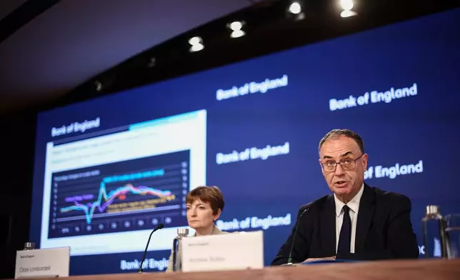 Bank of England (BoE) Governor Andrew Bailey, right, and BoE Deputy Governor Clare Lombardelli attend the Monetary Policy Report press conference in London, Thursday, July 30, 2026. (Henry Nicholls/Pool Photo via AP)
