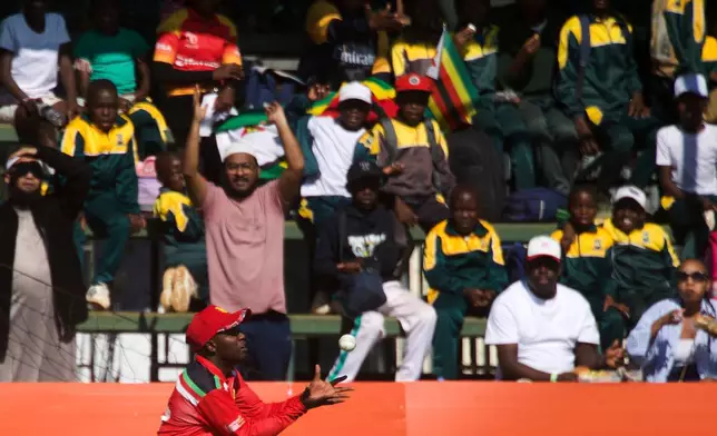 Zimbabwe's fielder Wessly Madhevere takes a catch during the third T20 cricket match between Zimbabwe and India in Harare, Zimbabwe, Sunday, July 26, 2026. (AP Photo/Wonder Mashura)
