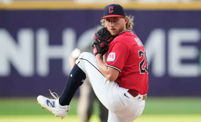 Cleveland Guardians' Tanner Bibee pitches in the second inning of a baseball game against the Texas Rangers in Cleveland, Tuesday, June 30, 2026. (AP Photo/Sue Ogrocki)