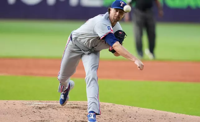 Texas Rangers' Jacob Degrom pitches in the second inning of a baseball game against the Cleveland Guardians in Cleveland, Tuesday, June 30, 2026. (AP Photo/Sue Ogrocki)