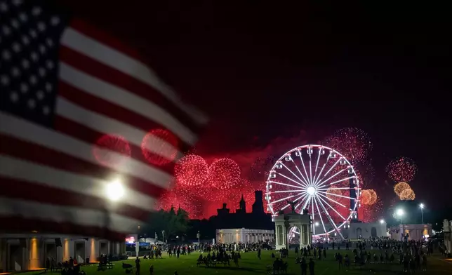 Fireworks explode during the Great American State Fair on the National Mall, Sunday, July 5, 2026, in Washington. (AP Photo/Rod Lamkey, Jr.)