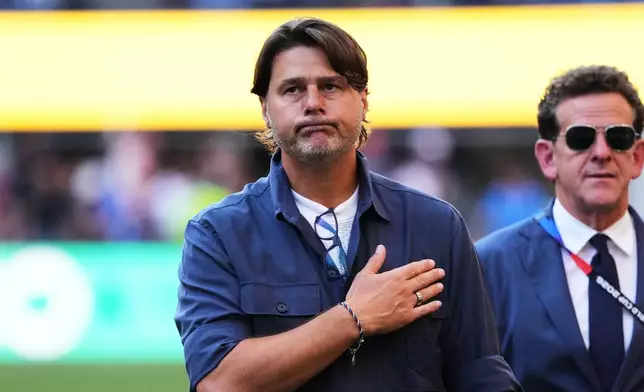 United States head coach Mauricio Pochettino walks off the pitch after losing to Belgium in their World Cup round of 16 soccer match in Seattle, Monday, July 6, 2026. (AP Photo/Ted S. Warren)