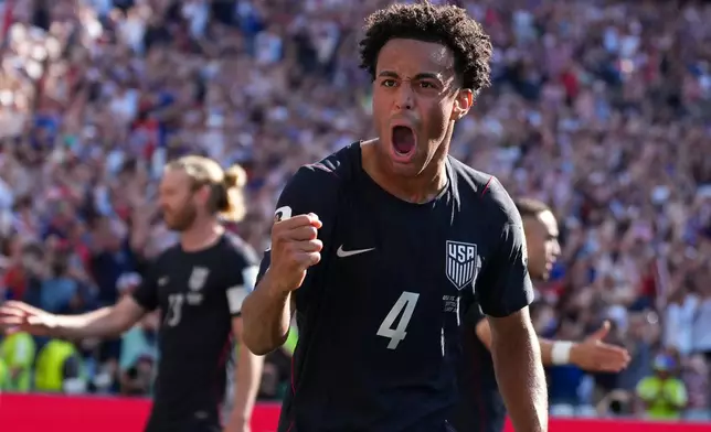 United States' Tyler Adams celebrates after Malik Tillman scored their first goal from a free kick during the World Cup round of 16 soccer match between the United States and Belgium in Seattle, Monday, July 6, 2026. (AP Photo/Abbie Parr)