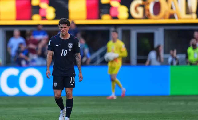United States' Christian Pulisic (10) reacts after Belgium scored a goal during the World Cup round of 16 soccer match between the United States and Belgium in Seattle, Monday, July 6, 2026. (AP Photo/Abbie Parr)