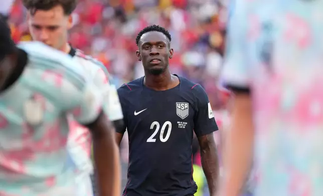 United States' Folarin Balogun (20) walks off the field after the first period during the World Cup round of 16 soccer match in Seattle, Monday, July 6, 2026. (AP Photo/Ted S. Warren)