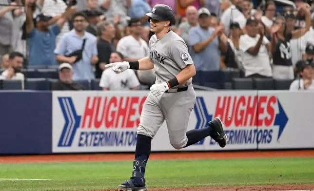 New York Yankees' Ben Rice rounds the bases after his three-run homer during the third inning of a baseball game against the Tampa Bay Rays, Tuesday, July 7, 2026, in St. Petersburg, Fla. (AP Photo/Jason Behnken)