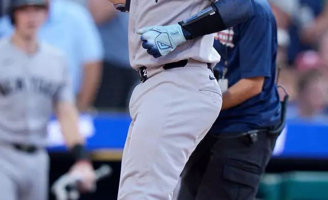 New York Yankees' Austin Wells scores on his home run during the third inning of a baseball game against the Philadelphia Phillies, Saturday, July 25, 2026, in Philadelphia. (AP Photo/Chris Szagola)