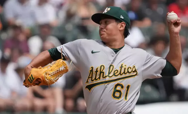 Athletics pitcher Gage Jump shows the ball against the Chicago White Sox during the first inning of a baseball game Saturday, July 11, 2026, in Chicago. (AP Photo/David Banks)