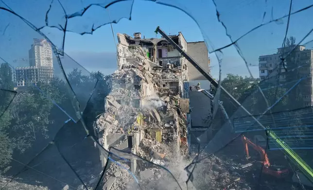 A residential apartment building is seen damaged after a Russian strike on Kyiv, Ukraine, Thursday, July 2, 2026. (AP Photo/Efrem Lukatsky)