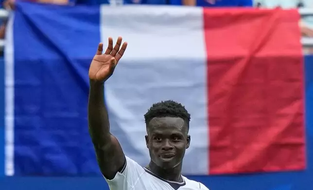 England's Bukayo Saka (7) celebrates scoring their fourth goal during the World Cup third-place playoff soccer match between France and England in Miami Gardens, Fla., Saturday, July 18, 2026. (AP Photo/Lynne Sladky)