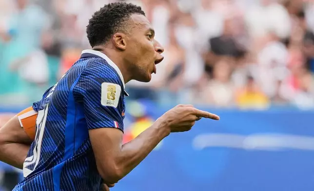 France's Kylian Mbappe (10) celebrates scoring his side's third goal during the World Cup third-place playoff soccer match between France and England in Miami Gardens, Fla., Saturday, July 18, 2026. (AP Photo/Rebecca Blackwell)