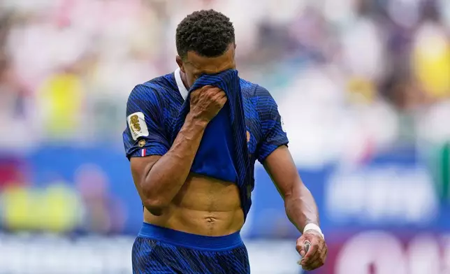 France's Kylian Mbappe (10) walks off the pitch during the World Cup third-place playoff soccer match between France and England in Miami Gardens, Fla., Saturday, July 18, 2026. (AP Photo/Rebecca Blackwell)