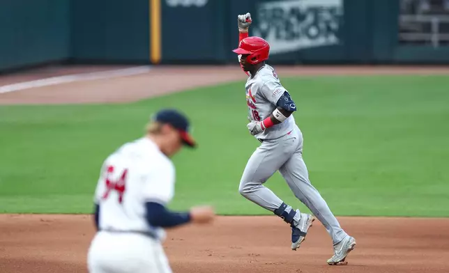 St. Louis Cardinals' Jordan Walker, right, reacts after hitting a three-run home run against Atlanta Braves pitcher Hurston Waldrep in the first inning of a baseball game, Thursday, July 2, 2026, in Atlanta. (AP Photo/Colin Hubbard)