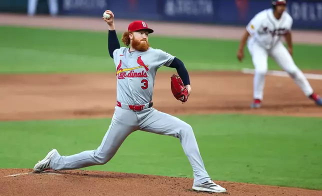 St. Louis Cardinals pitcher Dustin May (3) delivers in the first inning of a baseball game against the Atlanta Braves, Thursday, July 2, 2026, in Atlanta. (AP Photo/Colin Hubbard)