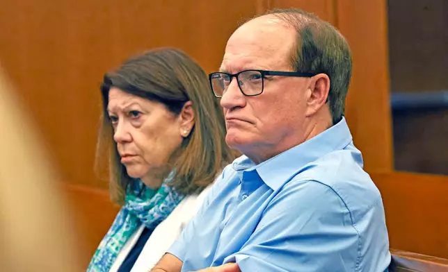 Paula and Mike Musgrove, parents of Lindsay Clancy, sit as jury selection starts in Lindsay's murder trial where she is charged in the 2023 killing of her three children, Monday, July 20, 2026, in Plymouth Superior Court in Plymouth, Mass. (Greg Derr/The Patriot Ledger via AP, Pool)