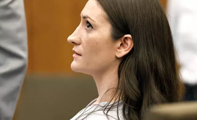 Lindsay Clancy sits as jury selection starts in her murder trial where she is charged in the 2023 killing of her three children, Monday, July 20, 2026, in Plymouth Superior Court in Plymouth, Mass. (Greg Derr/The Patriot Ledger via AP, Pool)