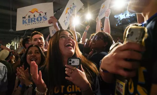 Attendees celebrate after Democratic congressional candidate Melat Kiros won the Democratic nomination during a primary election night watch party at The Broadway, Tuesday, June 30, 2026, in Denver. (AP Photo/Rebecca Slezak)