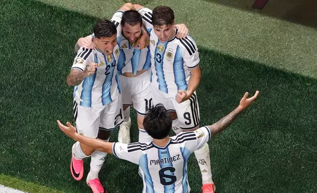 Argentina's Lionel Messi celebrates with his teammates after scoring his side's second goal during the World Cup round of 16 soccer match between Argentina and Egypt in Atlanta, Tuesday, July 7, 2026. (AP Photo/Butch Dill)