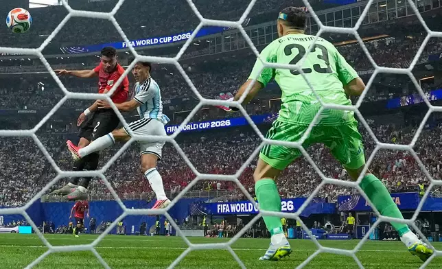 Egypt's Yasser Ibrahim (2) scores their opening goal during the World Cup round of 16 soccer match between Argentina and Egypt in Atlanta, Tuesday, July 7, 2026. (AP Photo/Mike Stewart)