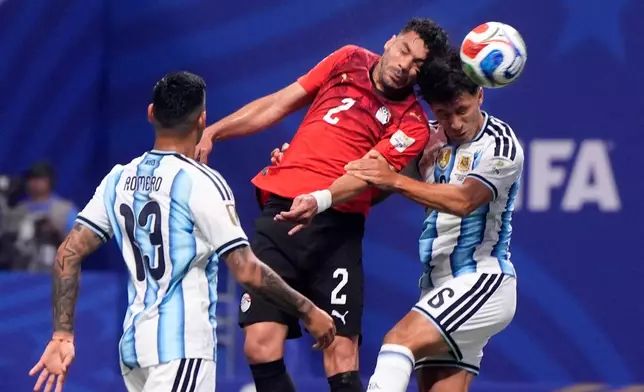 Egypt's Yasser Ibrahim (2) scores his side's opening opening goal during the World Cup round of 16 soccer match between Argentina and Egypt in Atlanta, Tuesday, July 7, 2026. (AP Photo/Mike Stewart)