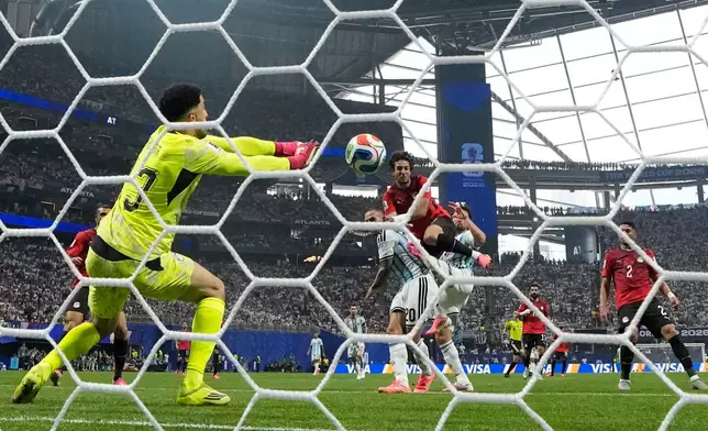 Egypt goalkeeper Mostafa Shoubir (23) makes a save during the World Cup round of 16 soccer match between Argentina and Egypt in Atlanta, Tuesday, July 7, 2026. (AP Photo/Erik S. Lesser)