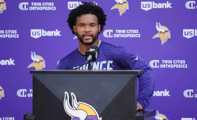 Minnesota Vikings quarterback Kyler Murray talks to reporters at the team's NFL football training camp Wednesday, July 29, 2026, in Eagan, Minn. (AP Photo/Abbie Parr)