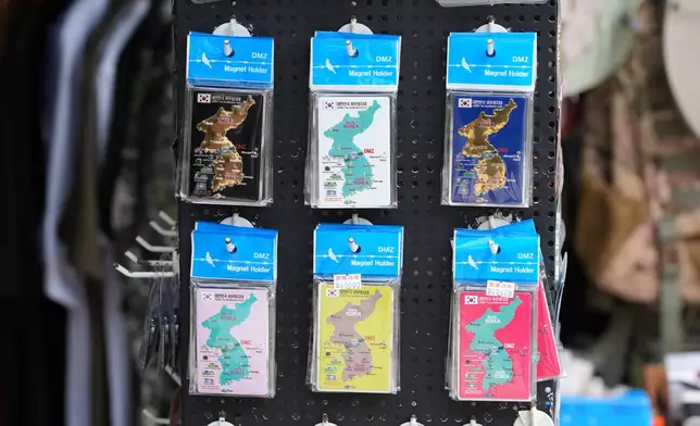 Magnets showing the Korean peninsular are displayed outside a souvenir shop in Paju, South Korea, Saturday, July 4, 2026. (AP Photo/Lee Jin-man)