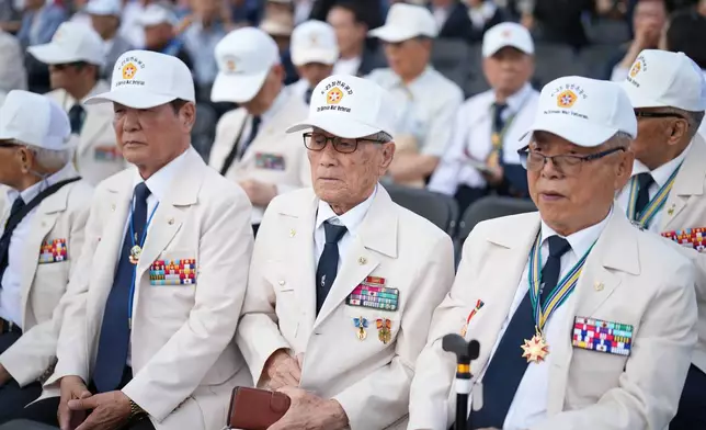 Korean War veterans attend during a ceremony to mark the 76th anniversary of the outbreak of the Korean War in Seoul, South Korea, Tuesday, June 23, 2026. (AP Photo/Lee Jin-man)
