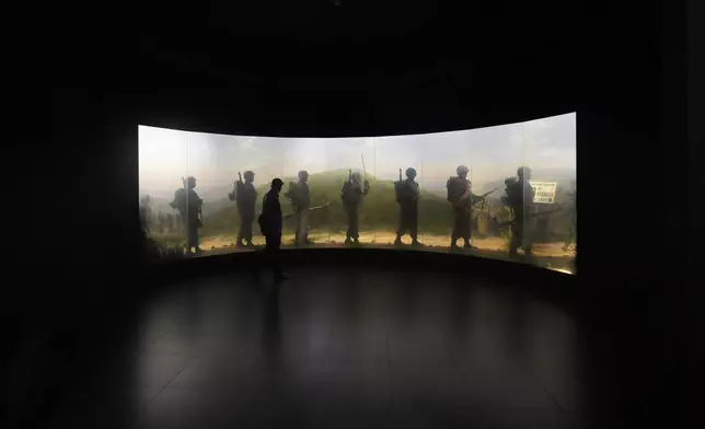 A visitor tours the exhibition hall of the Korean War at the War Memorial of Korea in Seoul, South Korea, Sunday, July 5, 2026. (AP Photo/Lee Jin-man)