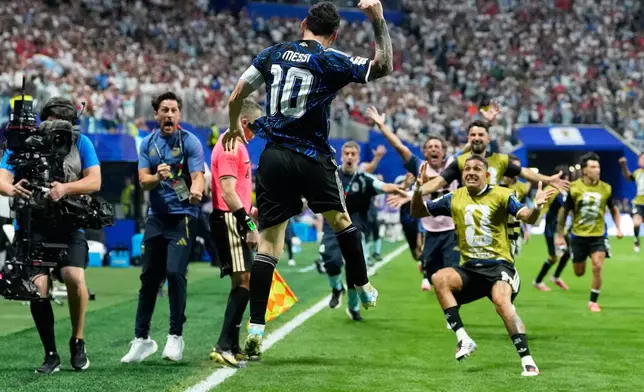 Argentina's Lionel Messi celebrates after teammate Lautaro Martinez scored their side's second goal during the World Cup semifinal soccer match between England and Argentina in Atlanta, Wednesday, July 15, 2026. (AP Photo/Rebecca Blackwell)