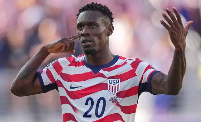 United States' Folarin Balogun (20) reacts after scoring his team's first goal during the World Cup round of 32 soccer match between the United States and Bosnia in Santa Clara, Calif., near San Francisco, Wednesday, July 1, 2026. (AP Photo/Julio Cortez)