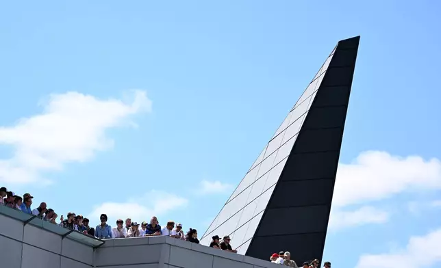 Fans watch the sprint race at the British F1 Grand Prix, in Silverstone, England, Saturday, July 4, 2026. (Peter Powell/Pool via AP)