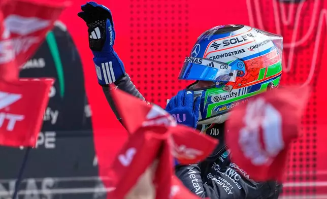 Mercedes driver Andrea Kimi Antonelli of Italy celebrates after winning the sprint race at the British F1 Grand Prix, in Silverstone, England, Saturday, July 4, 2026. (AP Photo/Darko Bandic)