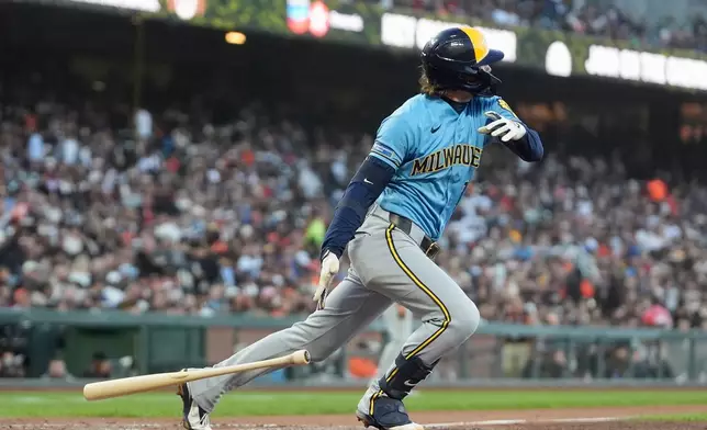 Milwaukee Brewers' Brice Turang watches his two-run single against the San Francisco Giants during the fourth inning of a baseball game, Tuesday, July 28, 2026, in San Francisco. (AP Photo/Jeff Chiu)