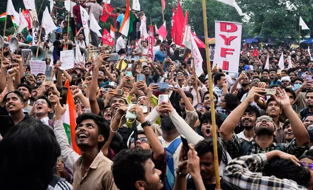 Student wing activists of different political parties join in a rally demanding educational reforms as part of the Cockroach Janta Party's ongoing protest movement, in Kolkata, India, Friday, July 24, 2026. (AP Photo/Bikas Das)
