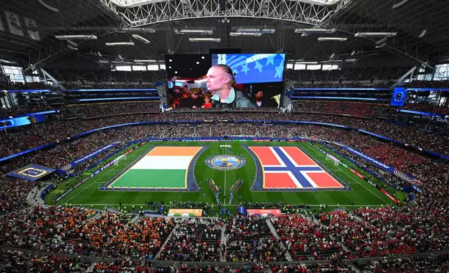 Norway's Erling Haaland (9) is shown on the big screen during teams presentation before the World Cup round of 32 soccer match between Ivory Coast and Norway in Arlington, Texas, near Dallas, Tuesday, June 30, 2026. (AP Photo/Jessica Tobias)