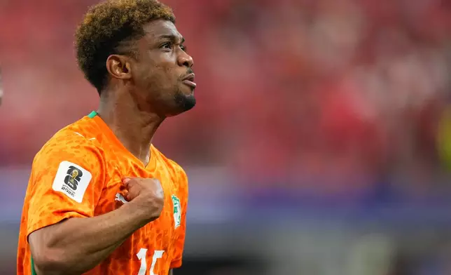 Ivory Coast's Amad Diallo (15) celebrates after scoring his side's opening goal during the World Cup round of 32 soccer match between Ivory Coast and Norway in Arlington, Texas, near Dallas, Tuesday, June 30, 2026. (AP Photo/Julio Cortez)