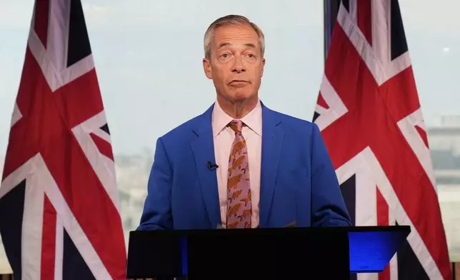 Reform UK leader Nigel Farage makes a statement to the media at the party headquarters in Millbank, central London, Tuesday July 7, 2026. (Gareth Fuller/PA via AP)