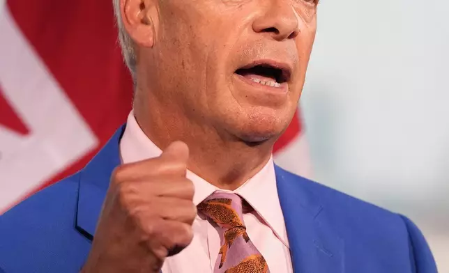 Reform UK leader Nigel Farage makes a statement to the media at the party headquarters in Millbank, central London, Tuesday July 7, 2026. (Gareth Fuller/PA via AP)