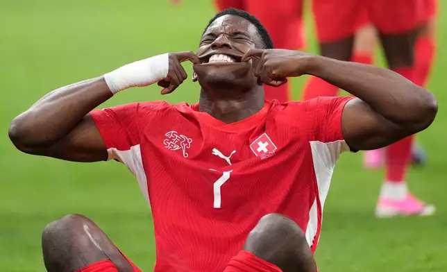 Switzerland's Breel Embolo (7) celebrates after scoring his team's first goal during the World Cup round of 32 soccer match between Switzerland and Algeria in Vancouver, British Columbia, Thursday, July 2, 2026. (AP Photo/Lindsey Wasson)