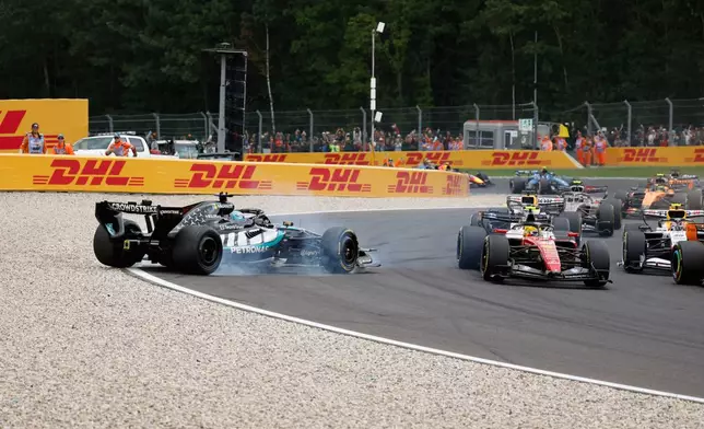 Mercedes driver George Russell of Britain spins off the track during the Formula One Grand Prix at the Spa-Francorchamps racetrack in Spa, Belgium, Sunday, July 19, 2026. (AP Photo/Geert Vanden Wijngaert)