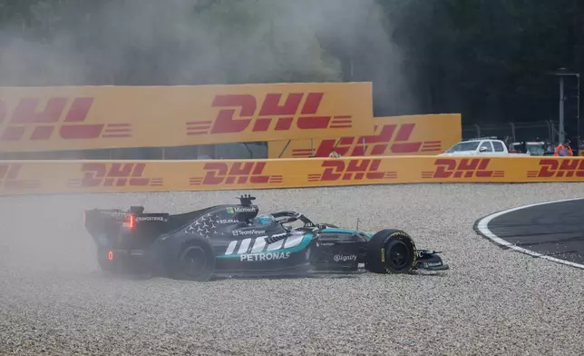 Mercedes driver George Russell of Britain spins off the track during the Formula One Grand Prix at the Spa-Francorchamps racetrack in Spa, Belgium, Sunday, July 19, 2026. (AP Photo/Geert Vanden Wijngaert)