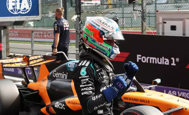 Mercedes driver Andrea Kimi Antonelli of Italy celebrates after clocking the fastest time during qualification ahead of the Formula One Grand Prix at the Spa-Francorchamps racetrack in Spa, Belgium, Saturday, July 18, 2026. (AP Photo/Omar Havana)