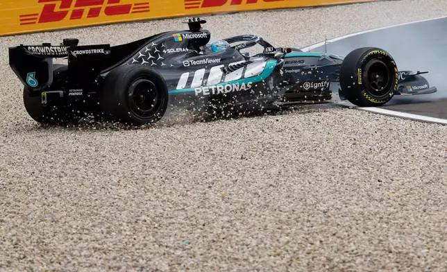 Mercedes driver George Russell of Britain spins off the track during the Formula One Grand Prix at the Spa-Francorchamps racetrack in Spa, Belgium, Sunday, July 19, 2026. (AP Photo/Geert Vanden Wijngaert)