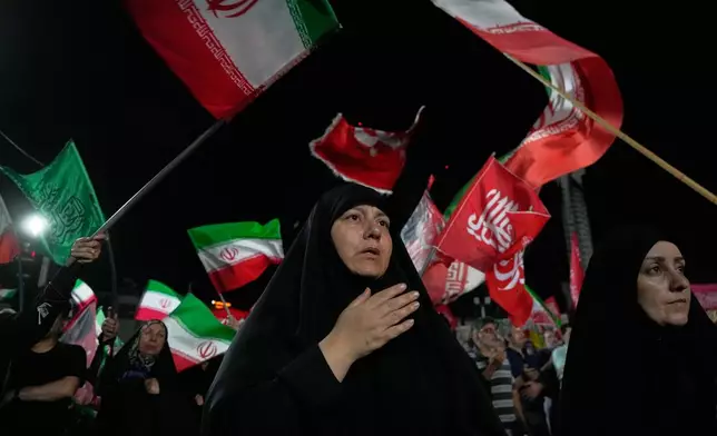 Pro-government demonstrators gather at a square in Tehran, Friday, July 17, 2026. (AP Photo/Vahid Salemi)