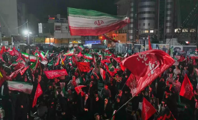 Pro-government demonstrators gather at a square in Tehran, Friday, July 17, 2026. (AP Photo/Vahid Salemi)