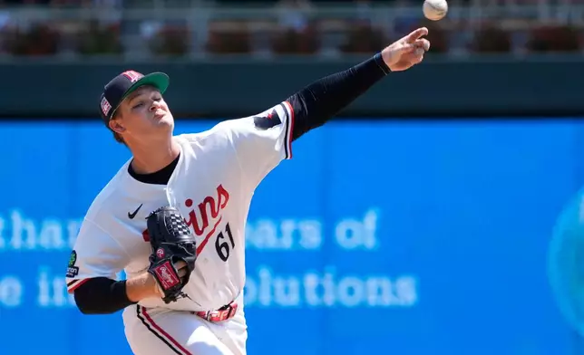 Minnesota Twins starting pitcher Connor Prielipp throws to the Athletics in the first inning of a baseball game Sunday, July 26, 2026, in Minneapolis. (AP Photo/Bruce Kluckhohn)