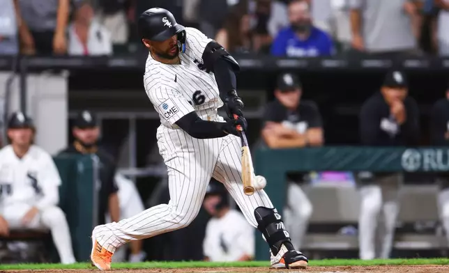 Chicago White Sox's Edgar Quero hits a walk off RBI single during the 12th inning of a baseball game against the New York Yankees in Chicago, Wednesday, July 29, 2026. (AP Photo/Jessie Alcheh)